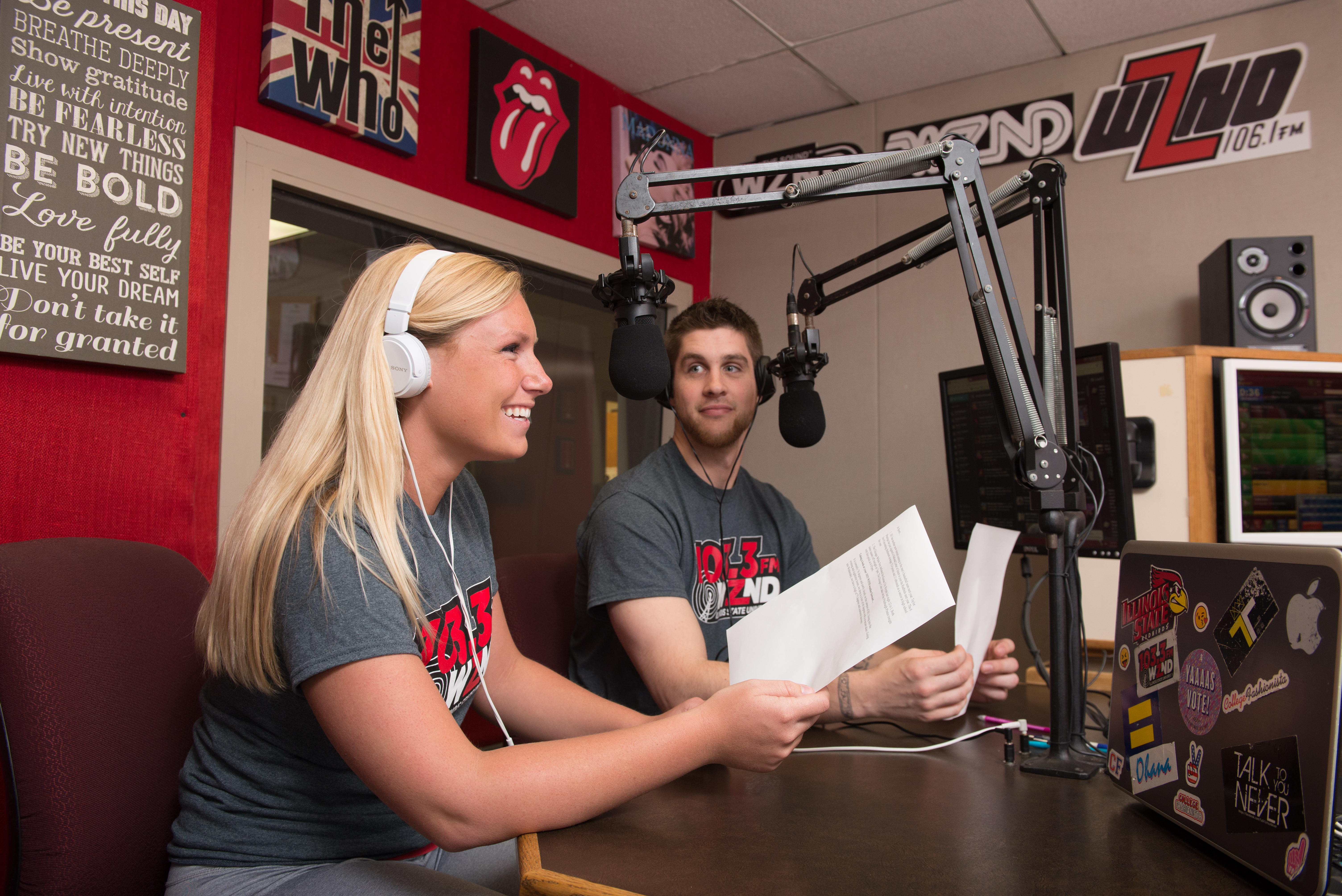 ISU female smiling and male looking while both in radio station room_33567.jpg