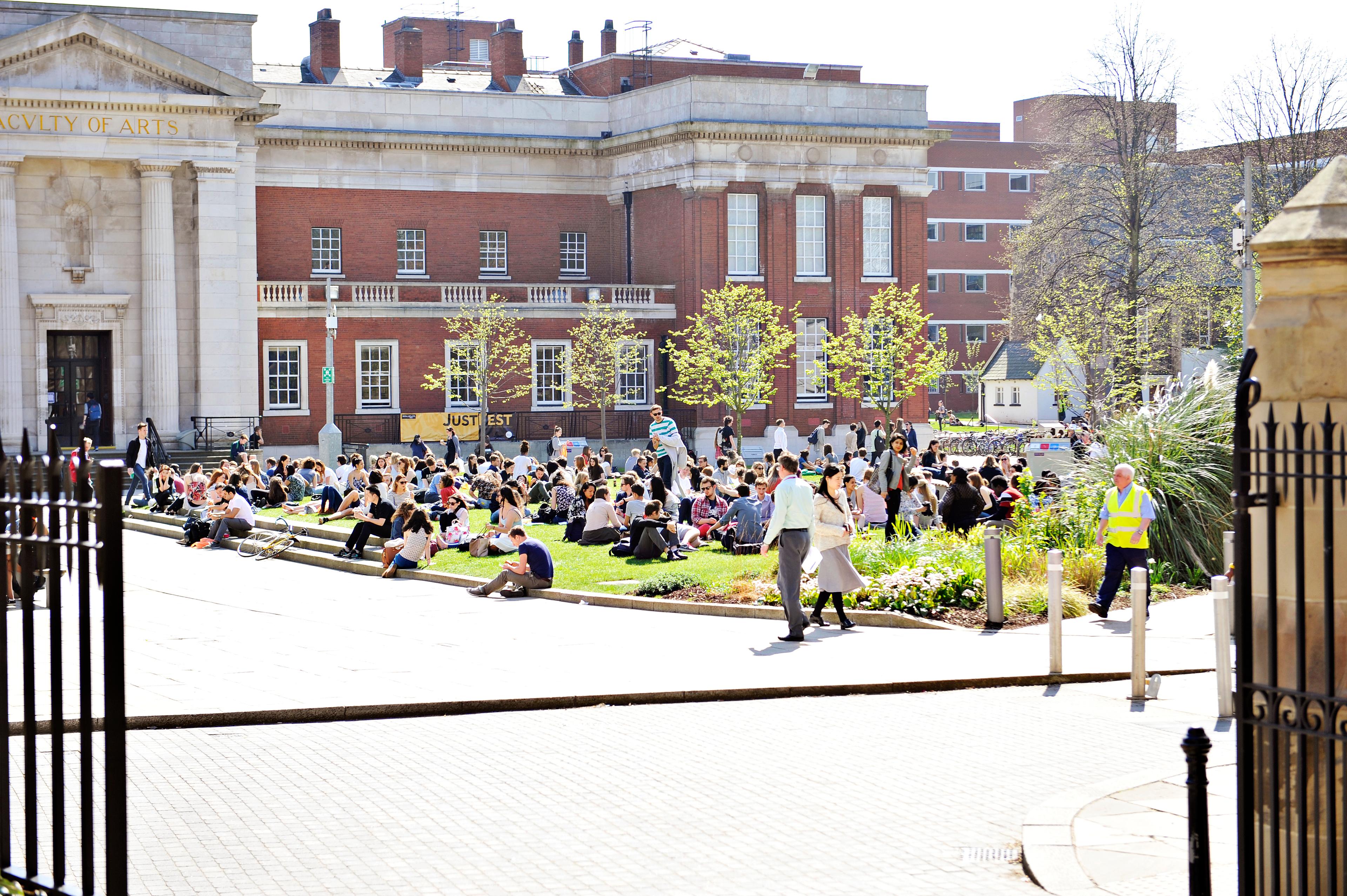 UOM students sat outside campus building_20907.JPG